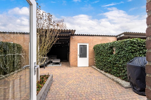 Foto - Te koop:  Verzorgde tussenwoning in Fijnaart!